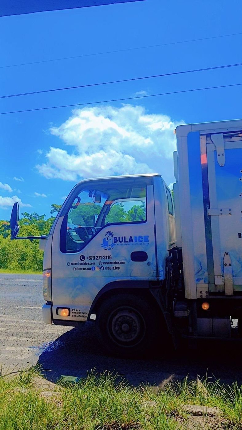 The Bula Ice truck cab under a blue sky